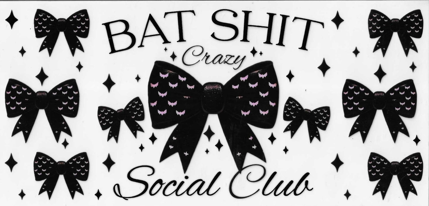 Decorative design with black bows and text on a white background
