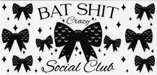 Decorative design with black bows and text on a white background