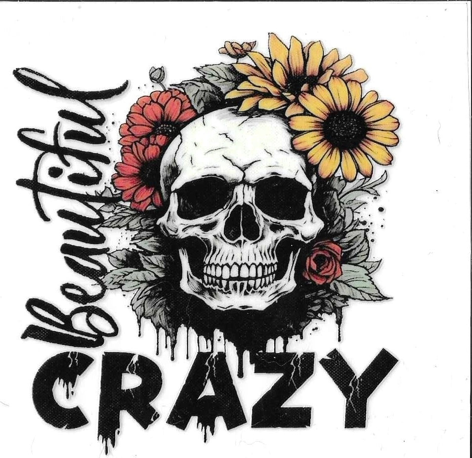 Skull with flowers and text 'Beautiful Crazy' on a white background