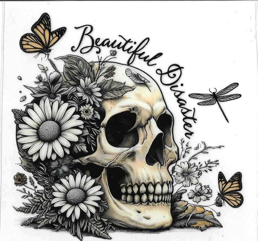 Skull with flowers, butterflies, and dragonflies on a white background with 'Beautiful Disaster' text.