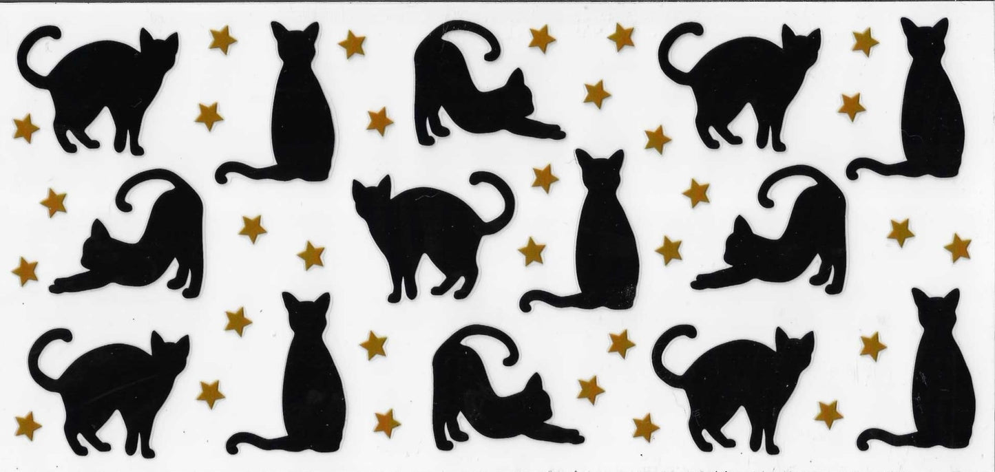 Silhouettes of black cats on a white background with gold stars