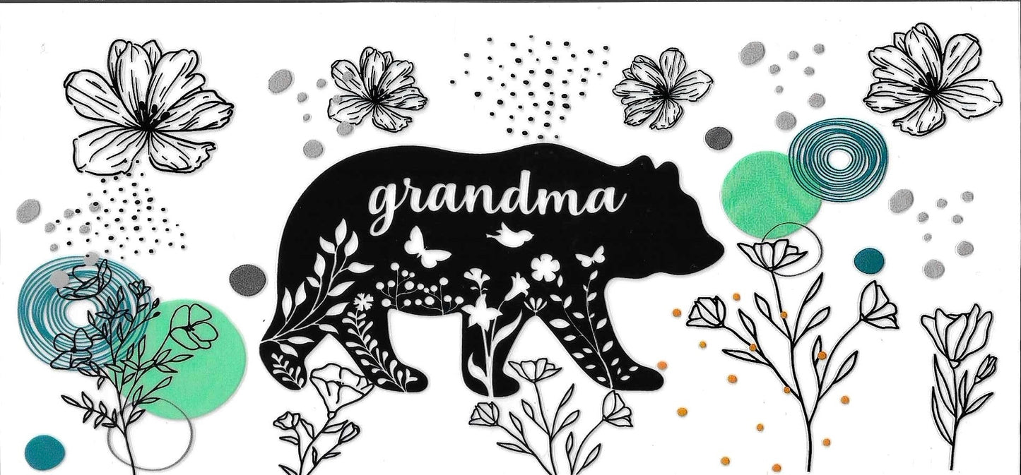 Black bear silhouette with 'grandma' text surrounded by flowers and decorative elements on a white background