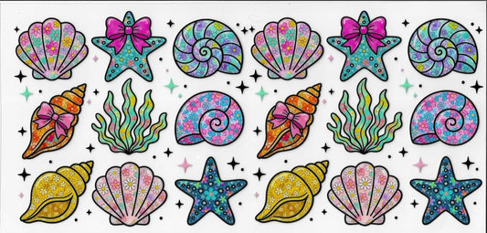 Colorful seashell and starfish designs on a black background