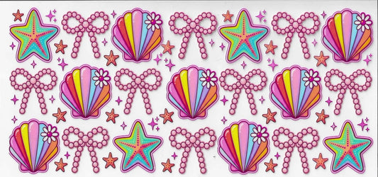 Pattern of colorful stars, shells, and bows on a white background
